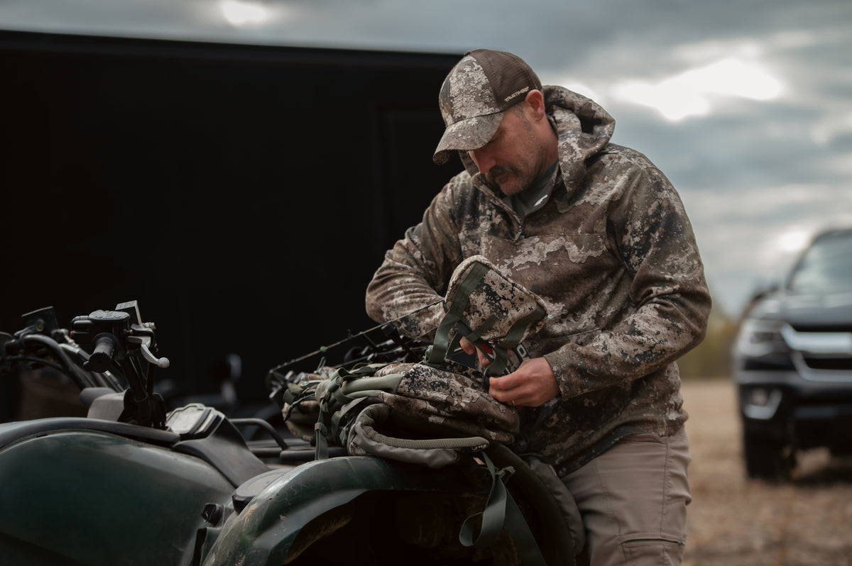Early-season scouting gear organized in a Forge Creek hunting day pack